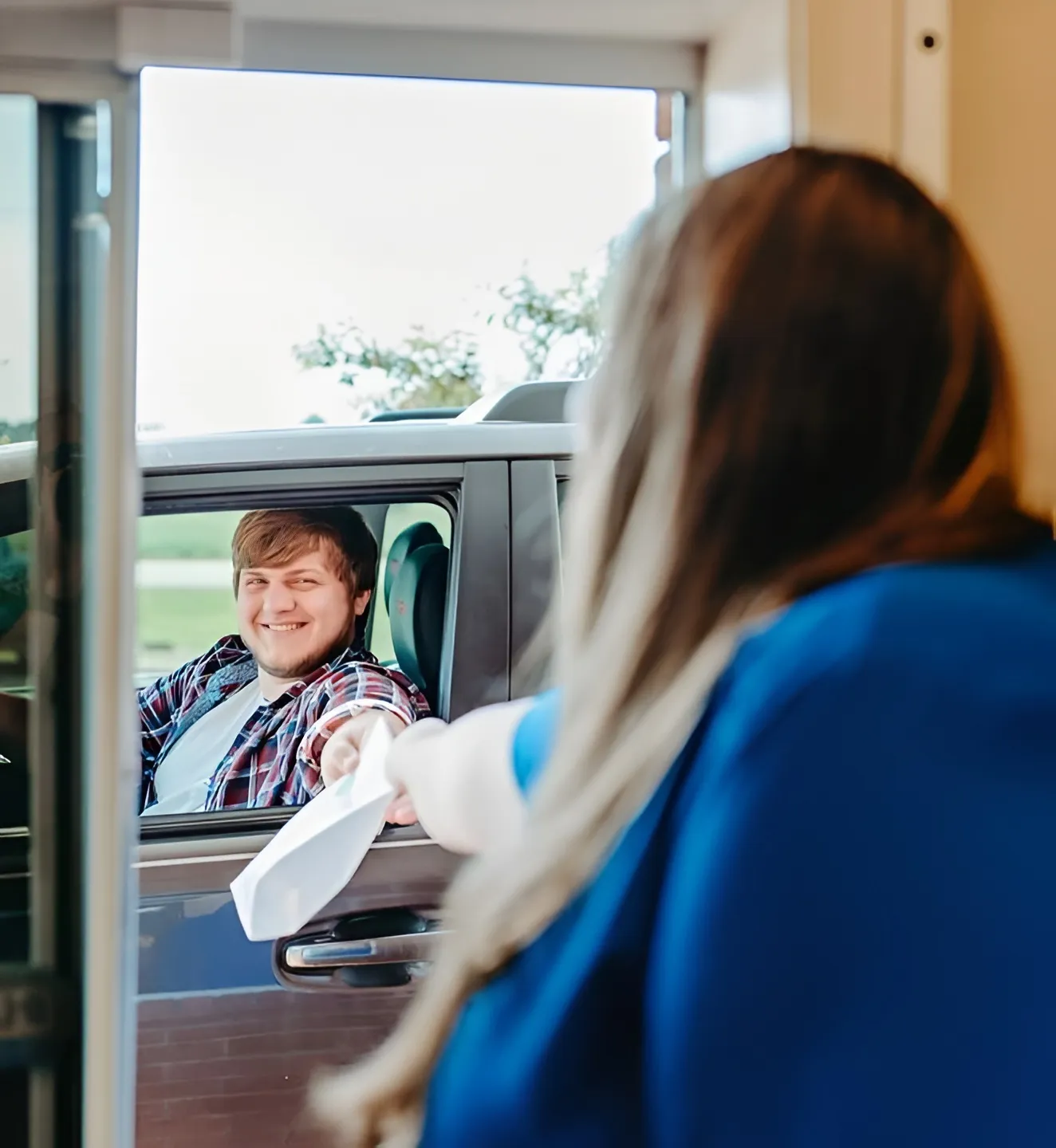 Happy patient visiting Iuka Discount Drugs.